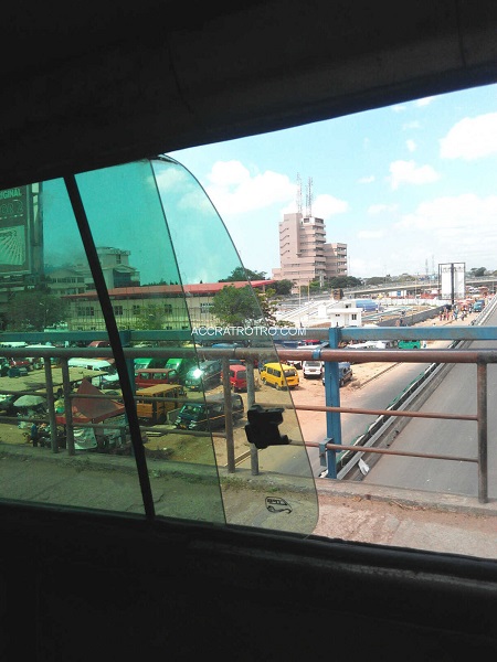 Overlooking Labadi trotro station from a bus