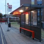 BUS STOP AT NIGHT IN THE CITY