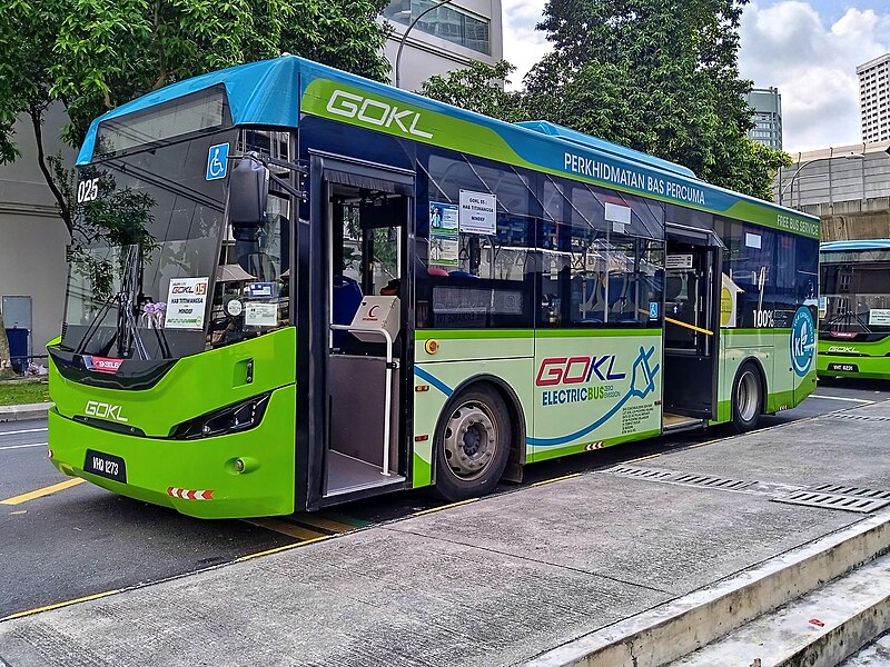 CITY BUS AT A STATION