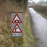 warning signs along a rural road