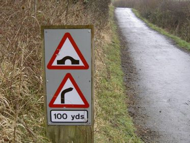 warning signs along a rural road