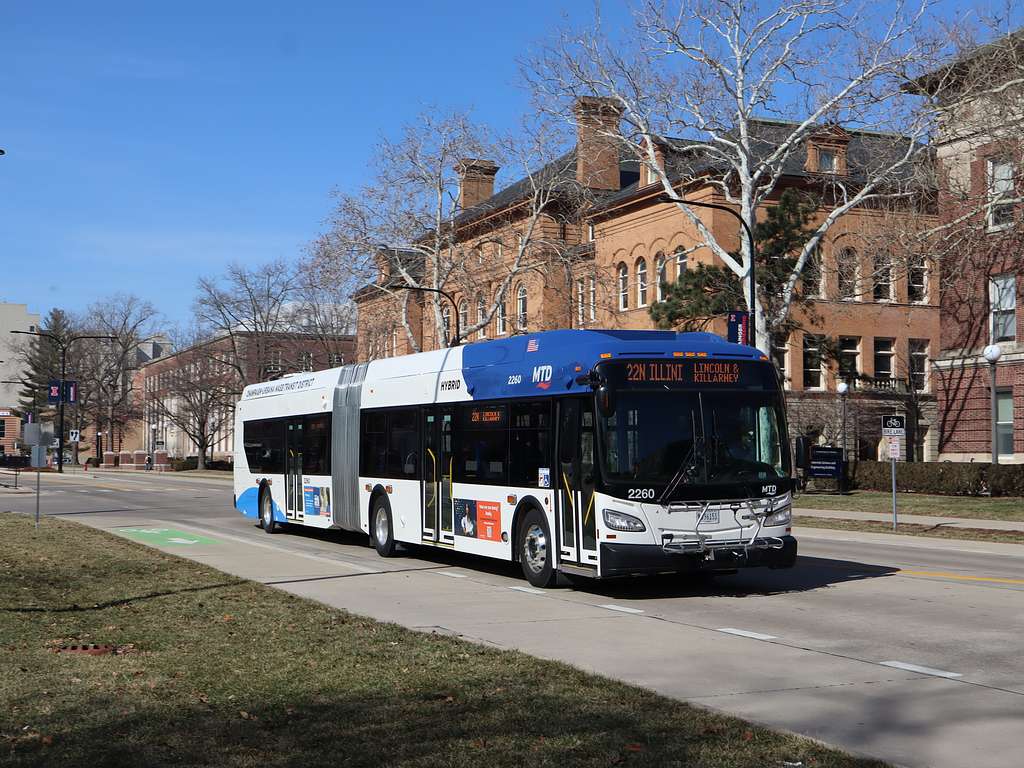 illinois mass transit passes in front of a home