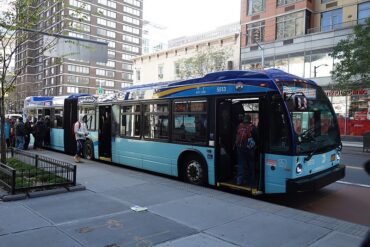 a bus approaches mid town bus terminal
