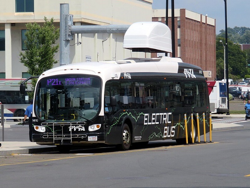 a bus at an electric charging station
