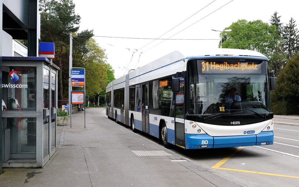 a bus exits a station in zurich