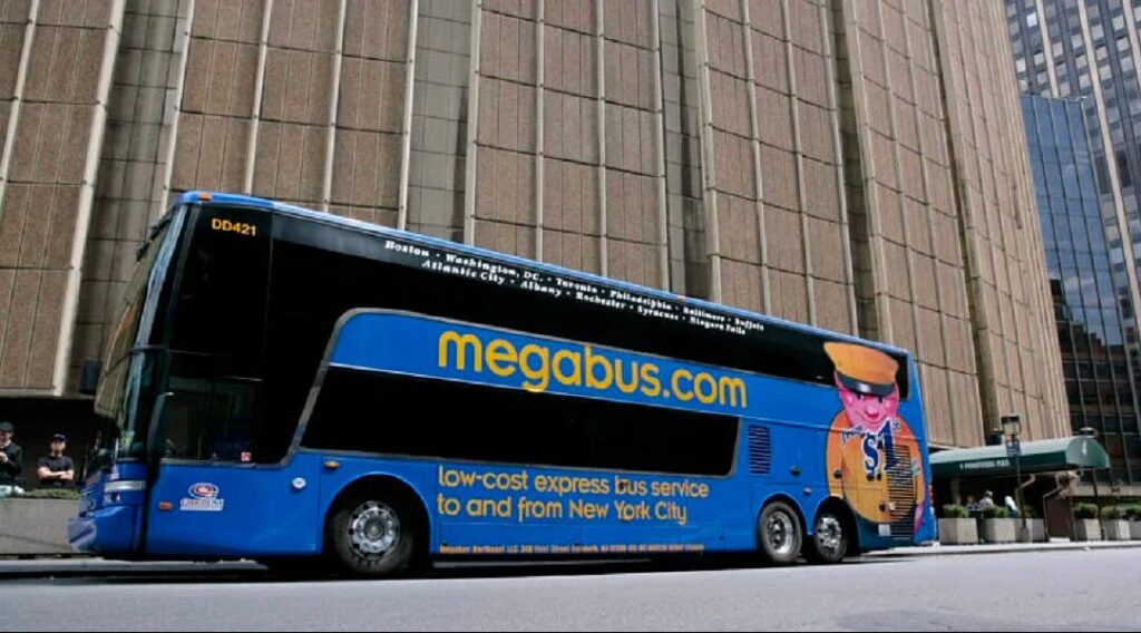 a mega bus about to take off