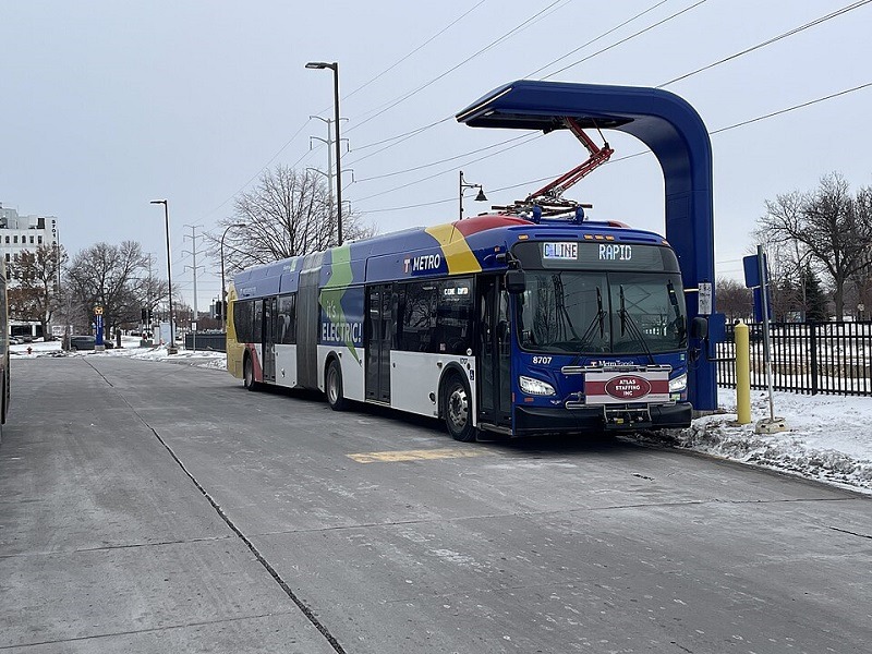electric bus at a charging station in Minnesota