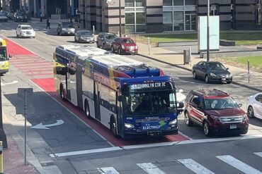electric bus at a cross walk