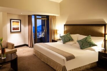 A bed in a hotel room