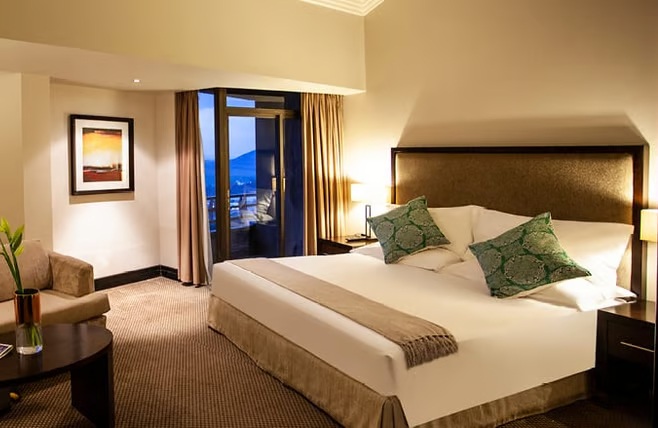 A bed in a hotel room