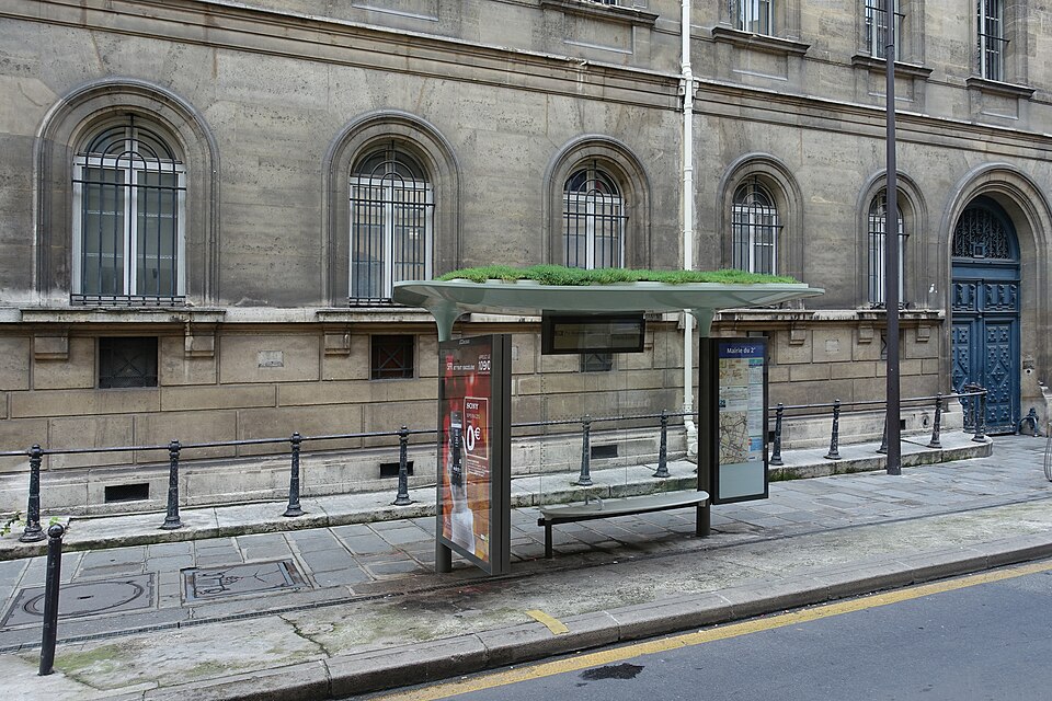a bus stop near a residence