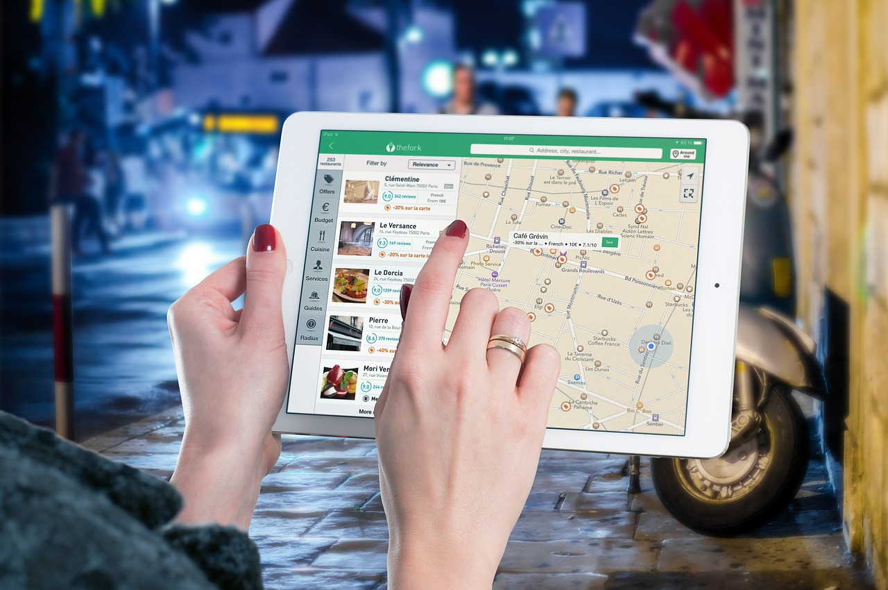 a trip planner app appears on a screen