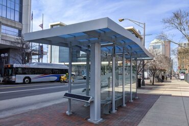 An upscale bus stop in the city