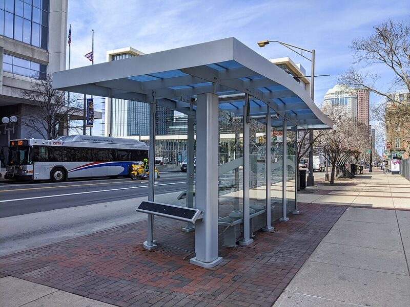 An upscale bus stop in the city