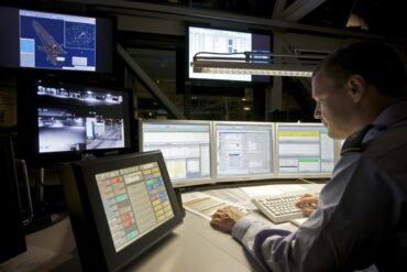 A man oversees intelligent traffic systems at work