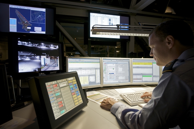 A man oversees intelligent traffic systems at work