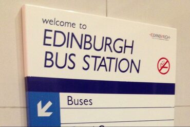 A sign welcomes passengers to the Edinburgh bus station