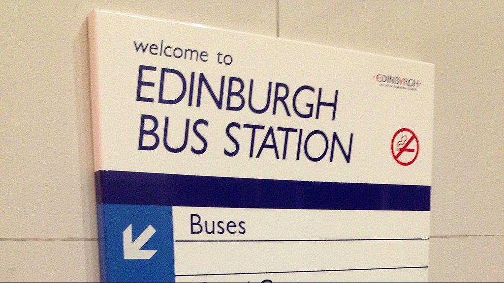 A sign welcomes passengers to the Edinburgh bus station