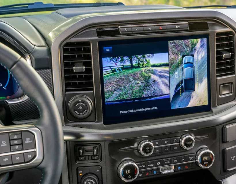 A vehicle dashboard displaying safety information