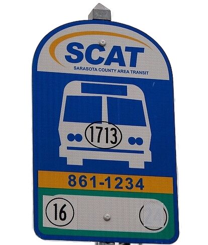 A SCAT bus sig along a road