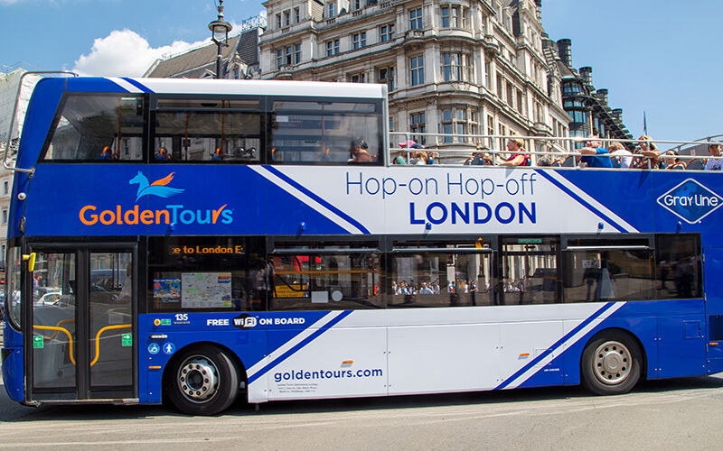 A bus cruises on a London street