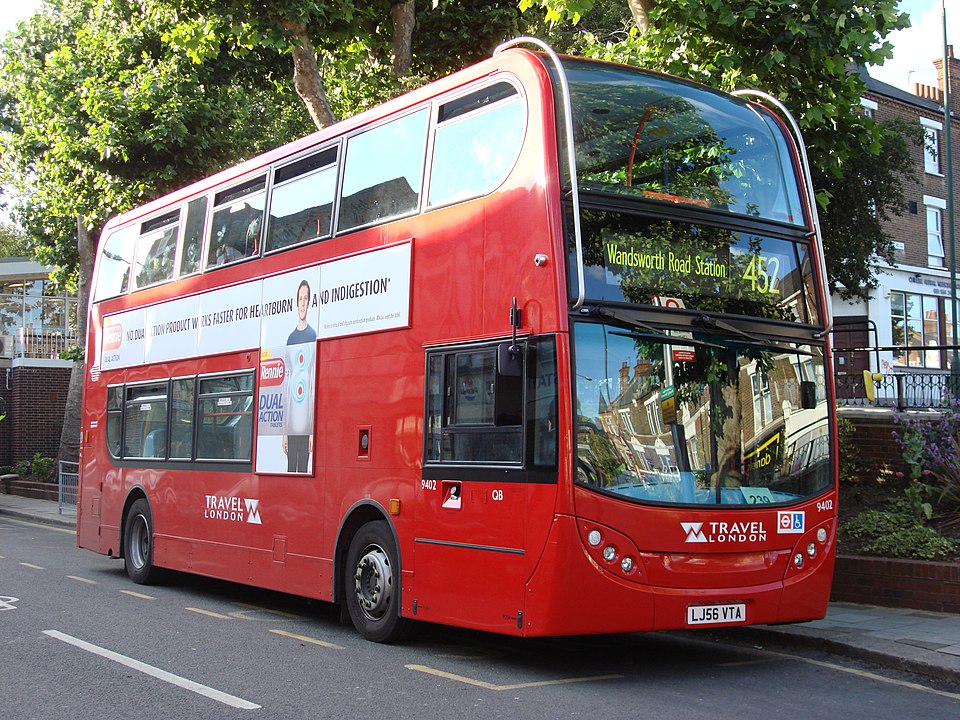 A bus in London begins arrives at a stop