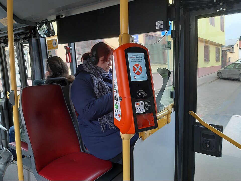 A bus payment system mounted on a coach