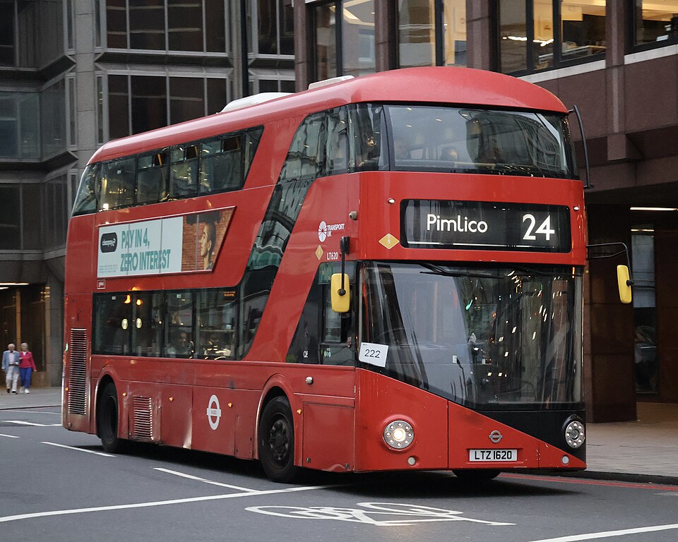 A bus stops on a street in London