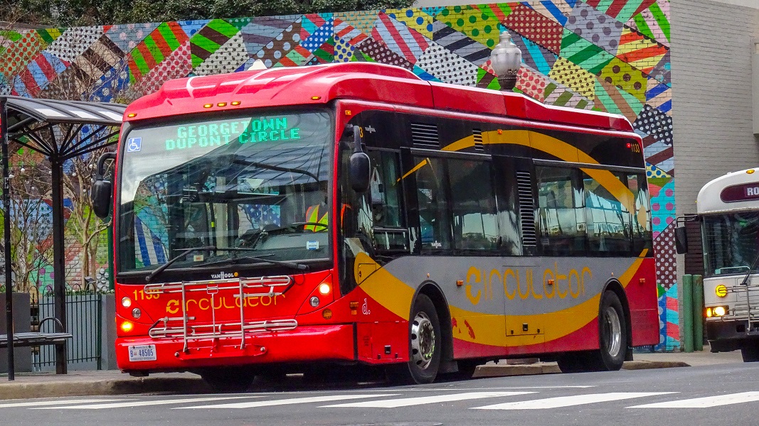 A circulator bus pars at a stop