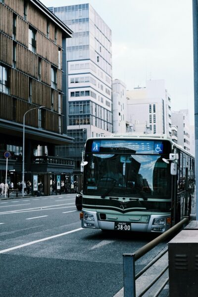 A city bus stops on its journey
