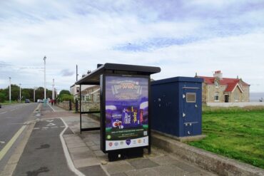 A digital bus shelter by the road side