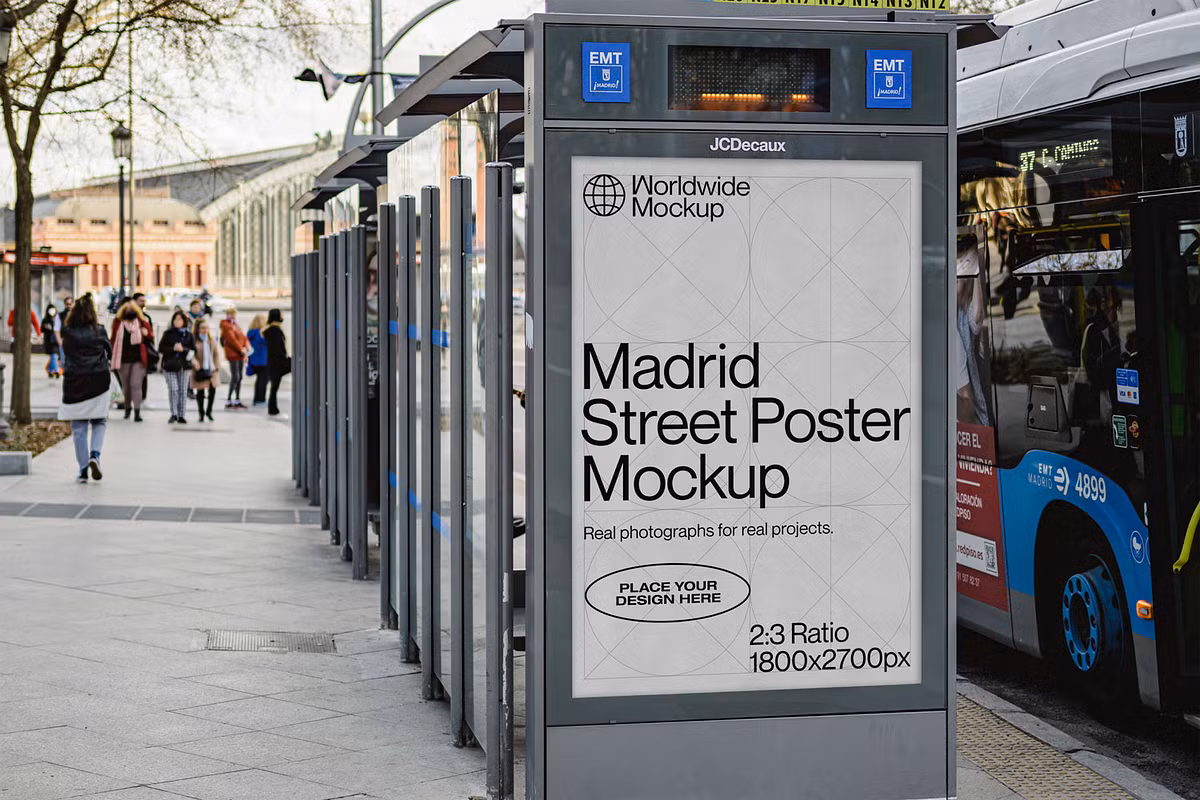 A digital bus stop displays an invitation to advertisers