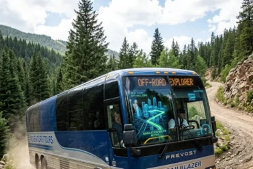 A sleeper bus drives the dirt road in the country