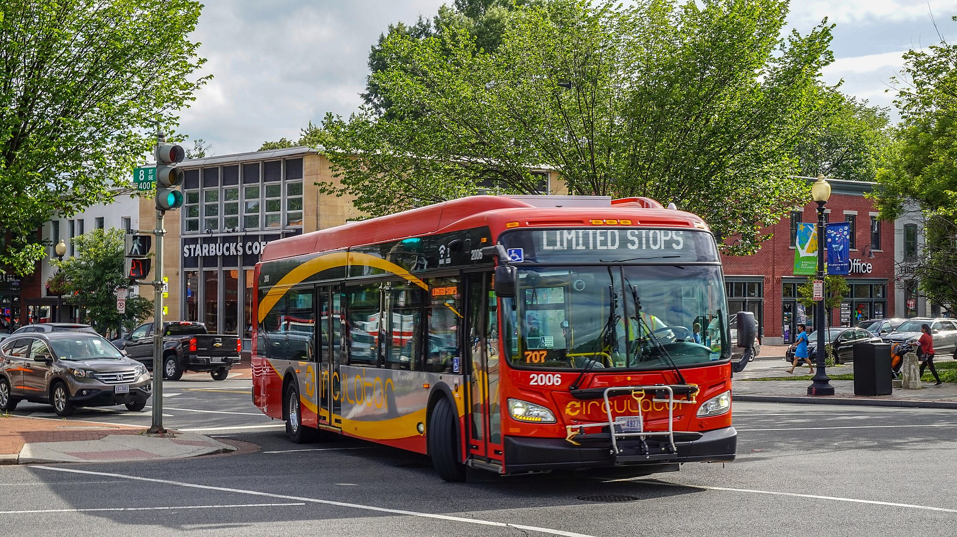 A transit bus on a limited stop jurney