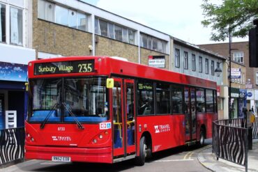 A Sunbury Village bus 235 arrives at a bus stop