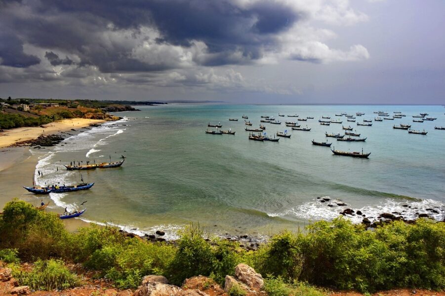 A beach with fishing canoes in Ghana