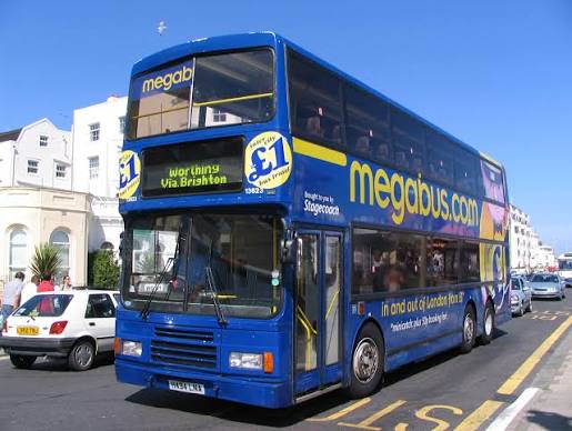 A Megabus at a traffic light