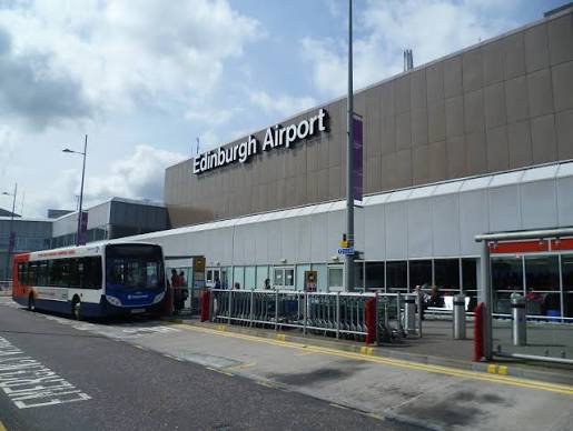 A bus parks at the entrance of Edinburgh Airport