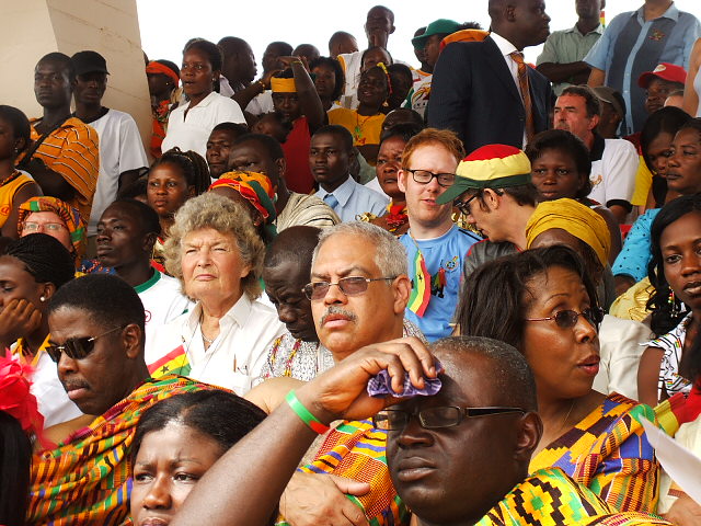 A mixed audience of black and whites in Ghana