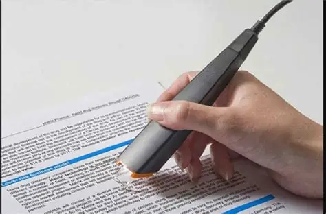 A woman operates an OCR device