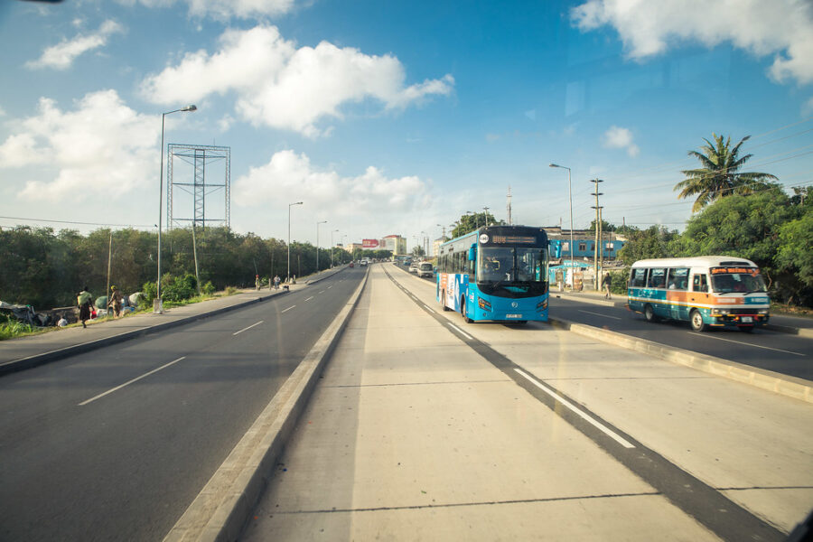 A bus moves alog a special lane of the BRT system
