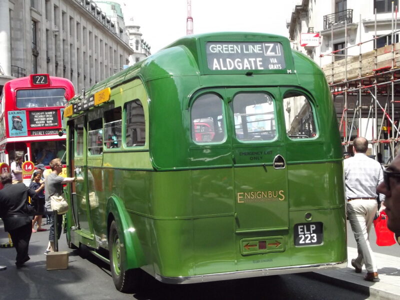 Rear view of a vintage green bus in London